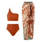 High Waisted 3 Piece Bikini Set with Cover Up Skirt displayed on a female model at the beach.