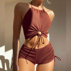 Close-up of the halter bikini top from the PeechLove Halter Bikini Shorts Set featuring a modern front tie detail.
