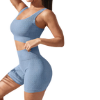 Side view of blue bra and pant set with seamless stretch workout fit