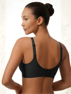 Back view of black backless push-up support bra with wide band and smooth support