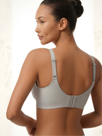 Back view of grey backless push-up support bra with adjustable straps and wide band