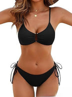 Model wearing the PeechLove Backless Two-Piece Bikini Set on the beach.