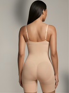 Back view of nude sling one-piece shapewear bodysuit with adjustable straps and lifting support