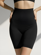Black high-waist tummy control shorts with ribbed waistband and firm shaping support