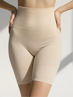 Nude high-waist tummy control shorts with ribbed waist compression and seamless support