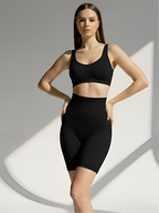 Black high-waist tummy control shorts for women with smooth compression and body shaping fit