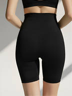Back view of black high-waist tummy control shorts with smoothing support and lift effect