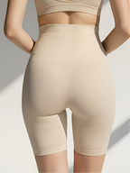 Back view of nude high-waist tummy control shorts with smoothing support and lift effect