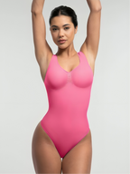 Pink bust support bodysuit for women with tummy control and smooth shaping fit