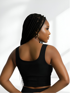 Back view of black push-up sports bra with wide straps and supportive activewear fit
