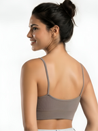 Back view of grey seamless camisole bra with thin straps and smooth support