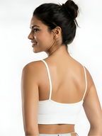 Back view of white seamless camisole bra with thin straps and smooth fit