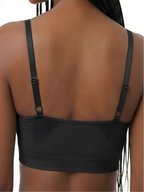 Back view of black seamless push-up lift bra with adjustable straps and smooth support
