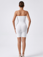 Back view of white strapless shorts shaper with seamless support and thigh coverage