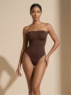 Brown strapless thong shaper for women with seamless tummy control and sculpting fit