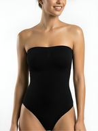 Close-up of black strapless sculpt bodysuit with smooth neckline and seamless support