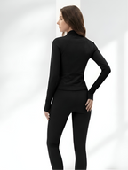 Back view of black yoga wear set with sculpting leggings and fitted jacket