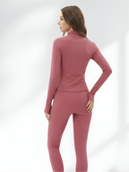 Back view of pink yoga wear set with stretch leggings and fitted jacket