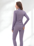 Back view of purple yoga wear set with sculpting leggings and smooth fit