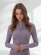 Close-up of purple yoga wear set with fitted zip-up activewear jacket