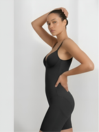 Side view of black backless shorts bodysuit with sculpting fit for dresses