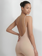 Side back view of tan backless bodysuit with shorts for smooth body contouring