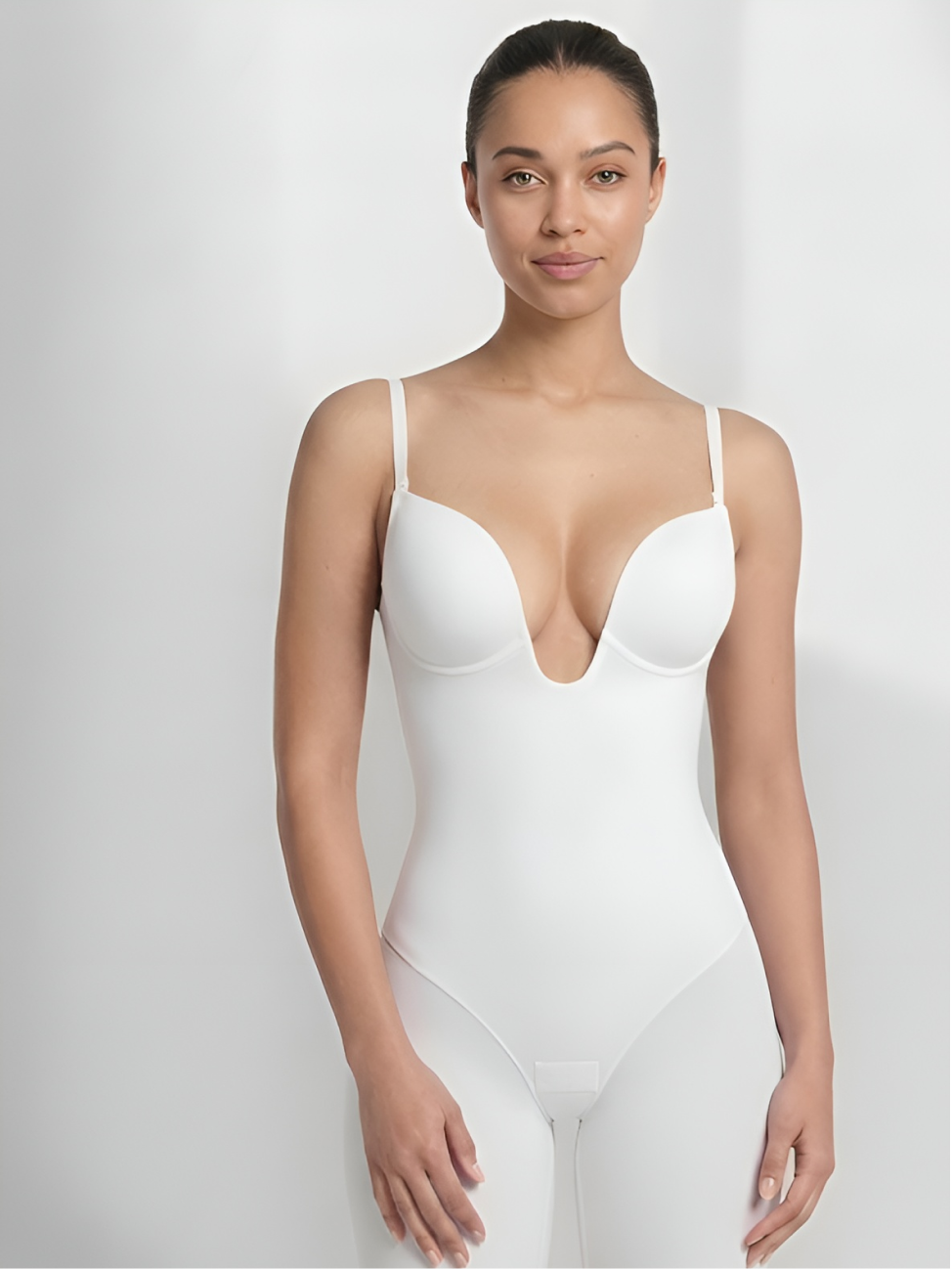 White backless shorts bodysuit for women with deep plunge front and seamless shaping