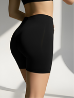 Side view of black shapewear shorts for thigh chafing protection and smooth coverage