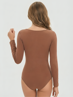 Back view of brown long sleeve shapewear bodysuit for smooth body contouring