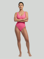 Pink bust support bodysuit for women with built-in support and seamless shaping