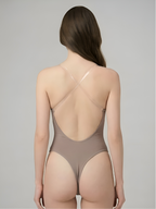 Back view of nude plunge backless shaper with low open back and invisible strap support