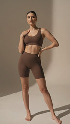 Brown matching bra and shorts set for women with sculpting workout fit