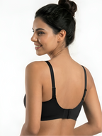 Back view of black seamless comfort bra with wide straps and smooth fit